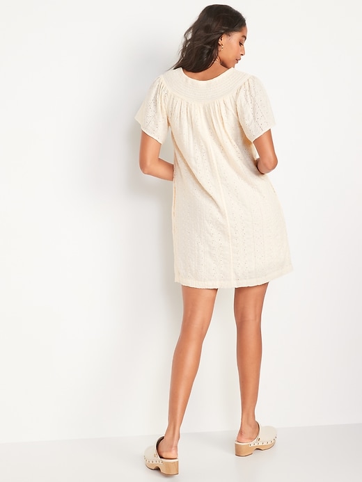 Image number 2 showing, Flutter-Sleeve Smocked Embroidered Mini Shift Dress for Women
