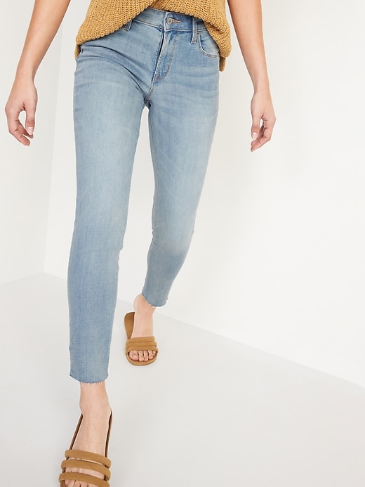 Image number 1 showing, Mid-Rise Rockstar Super Skinny Cut-Off Ankle Jeans for Women