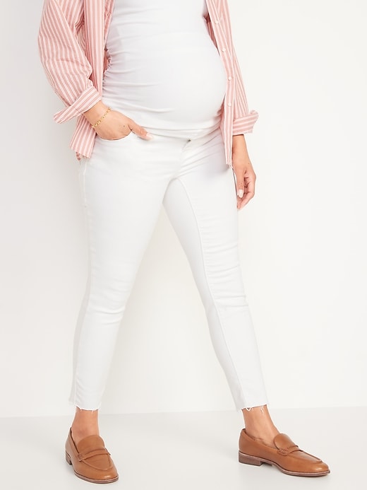 Image number 1 showing, Maternity Premium Full Panel Rockstar Super Skinny White Cut-Off Jeans