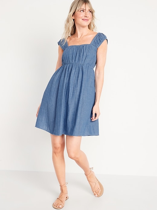 Image number 1 showing, Cap-Sleeve Chambray Cutout Bow-Detailed Mini Swing Dress for Women