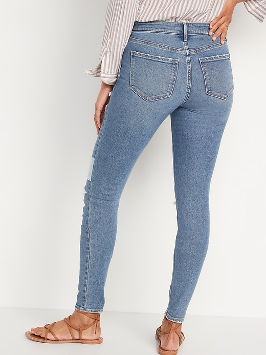 Image number 2 showing, Mid-Rise Rockstar Super-Skinny Patchwork Ripped Jeans for Women