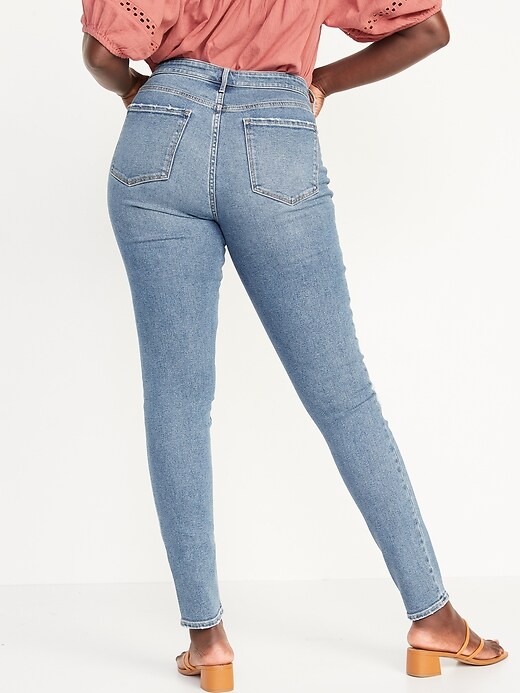 Image number 6 showing, Mid-Rise Rockstar Super-Skinny Patchwork Ripped Jeans for Women
