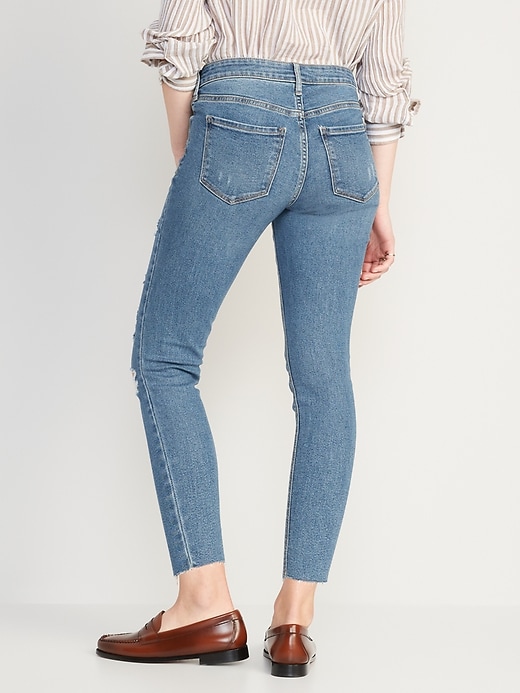 Image number 2 showing, Mid-Rise Rockstar Super Skinny Ripped Cut-Off Jeans