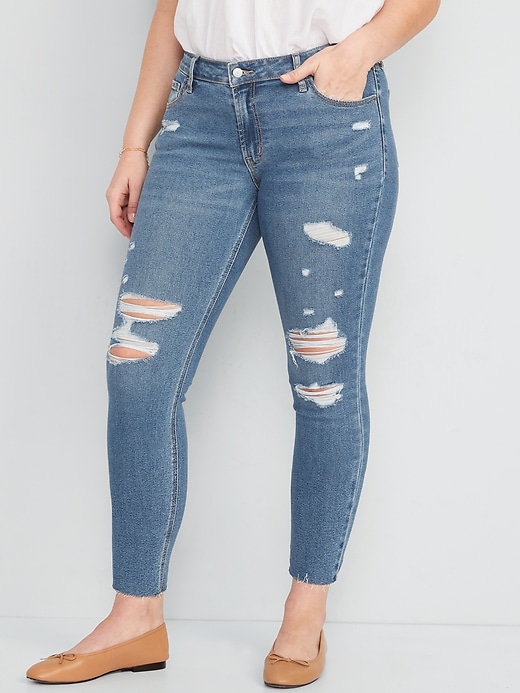 Image number 5 showing, Mid-Rise Rockstar Super Skinny Ripped Cut-Off Jeans