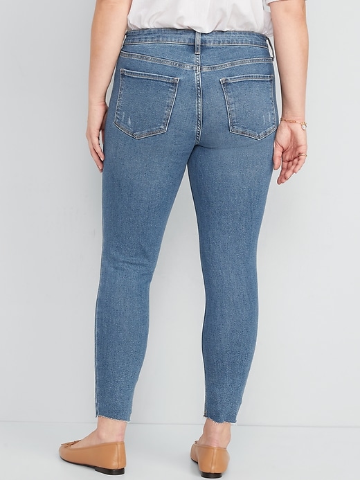 Image number 6 showing, Mid-Rise Rockstar Super Skinny Ripped Cut-Off Jeans