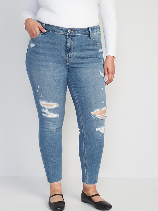 Image number 7 showing, Mid-Rise Rockstar Super Skinny Ripped Cut-Off Jeans