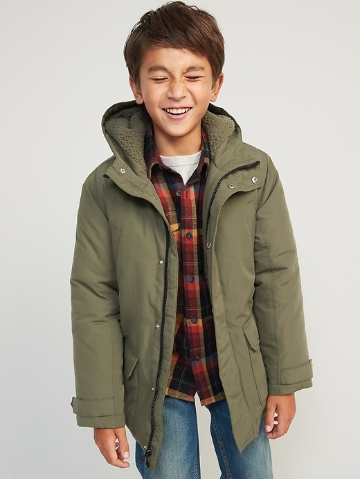 View large product image 1 of 3. Gender-Neutral Water-Resistant Hooded Sherpa-Lined Utility-Pocket Jacket for Kids
