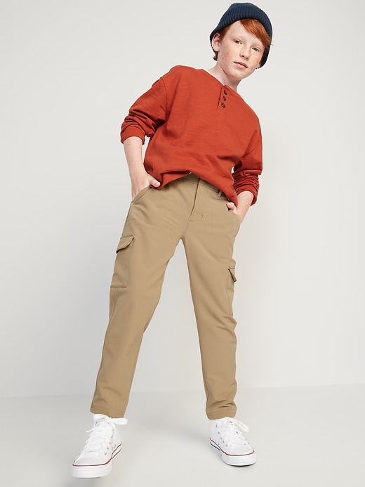 View large product image 2 of 3. StretchTech Tapered Cargo Performance Pants for Boys