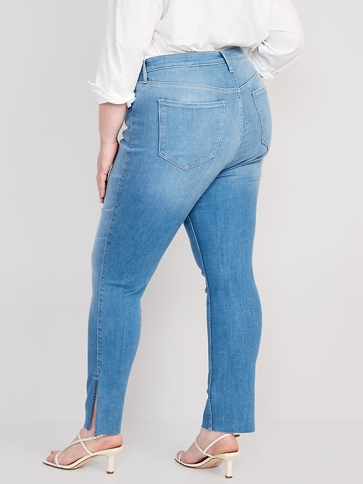 Image number 8 showing, Extra High-Waisted Rockstar 360° Stretch Super-Skinny Cut-Off Side-Split Jeans