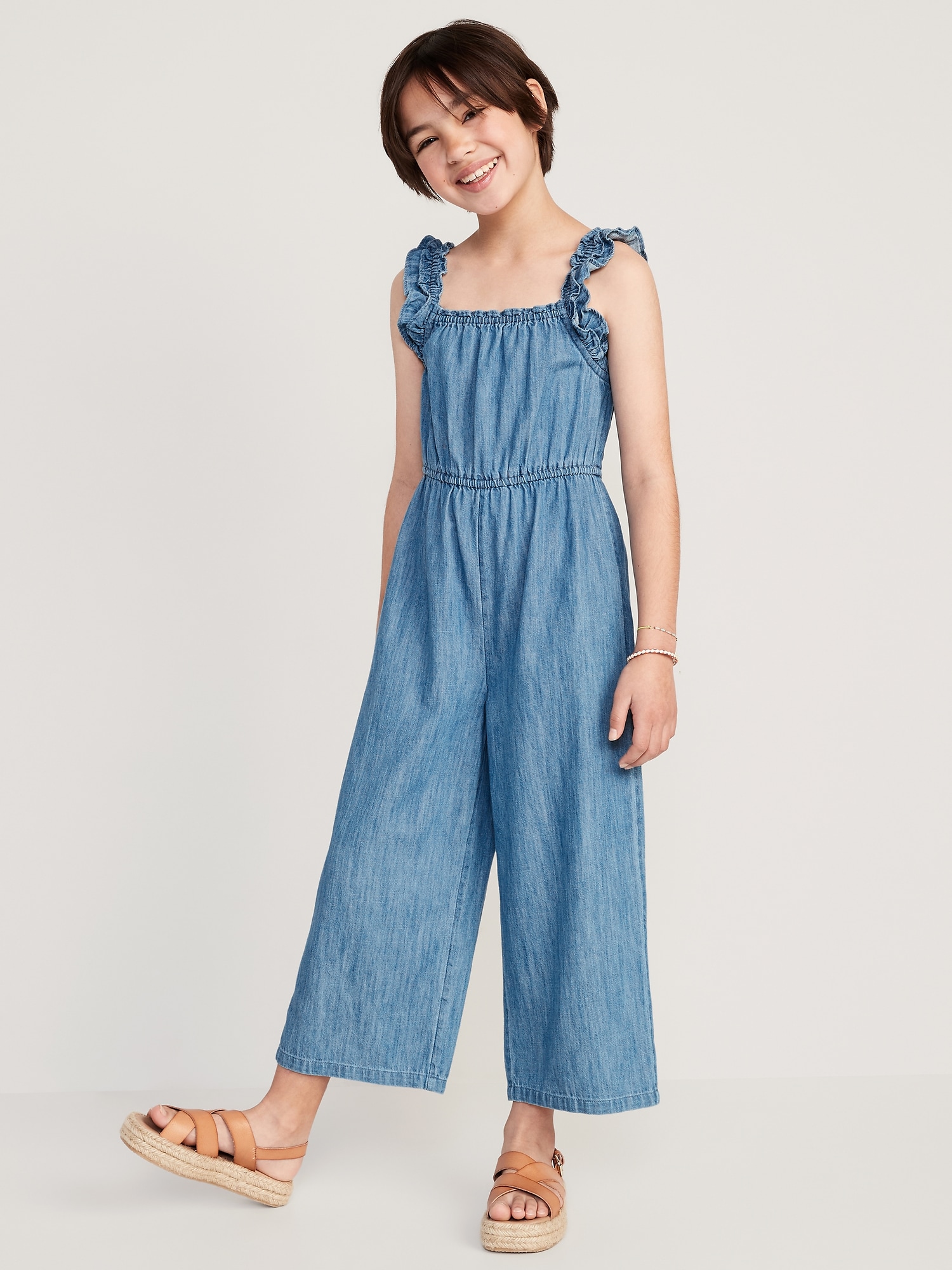 Old Navy Sleeveless Chambray Ruffle-Trim Jumpsuit for Girls blue. 1