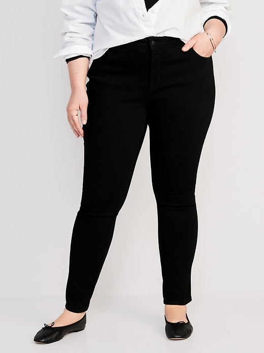 Image number 7 showing, Mid-Rise Pop Icon Black-Wash Skinny Jeans