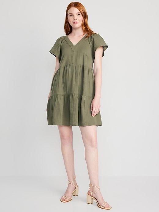 Image number 1 showing, V-Neck Tiered Mini Swing Dress