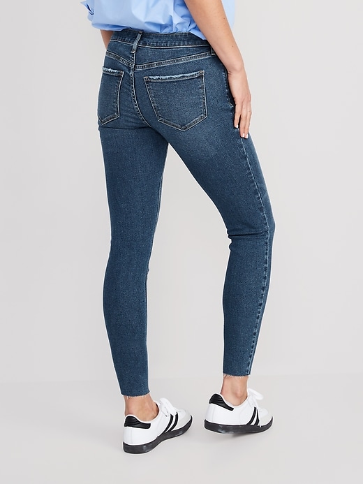 Image number 2 showing, Mid-Rise Rockstar Super-Skinny Cut-Off Ankle Jeans for Women