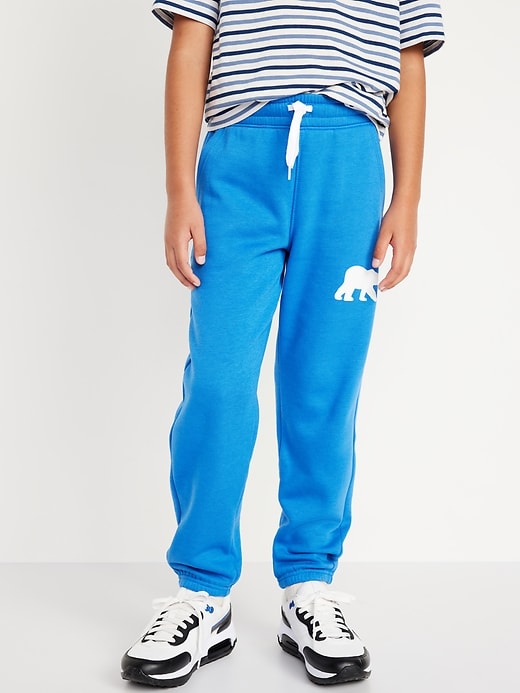 View large product image 1 of 4. Gender-Neutral Fleece Cinched Graphic Jogger Sweatpants for Kids