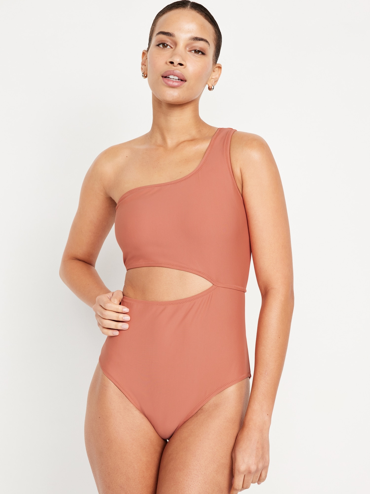 ASOS DESIGN asymmetric strappy one shoulder cut out swimsuit in