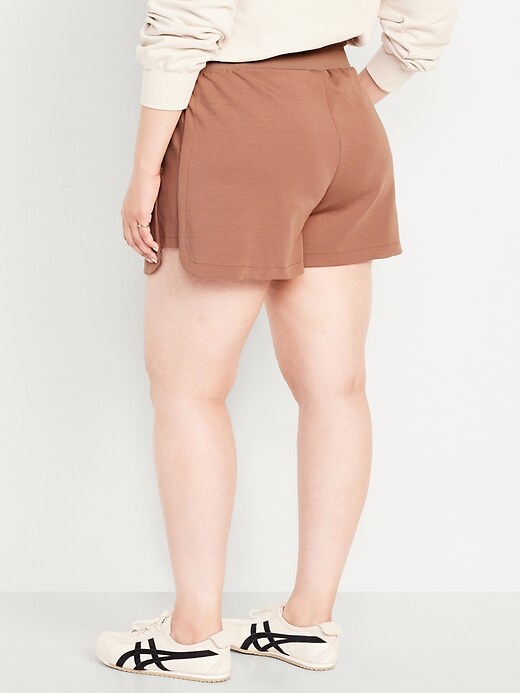 Image number 8 showing, Extra High-Waisted Dynamic Fleece Shorts -- 3.5-inch inseam