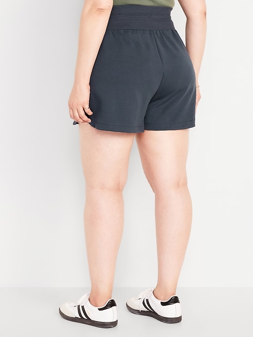 Image number 8 showing, Extra High-Waisted Dynamic Fleece Shorts -- 3.5-inch inseam