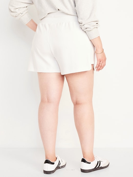 Image number 8 showing, Extra High-Waisted Dynamic Fleece Shorts -- 3.5-inch inseam