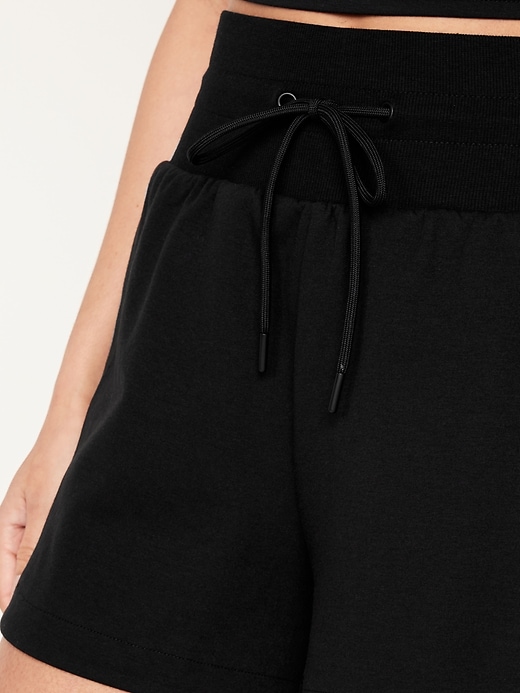 Image number 4 showing, Extra High-Waisted Dynamic Fleece Shorts -- 3.5-inch inseam