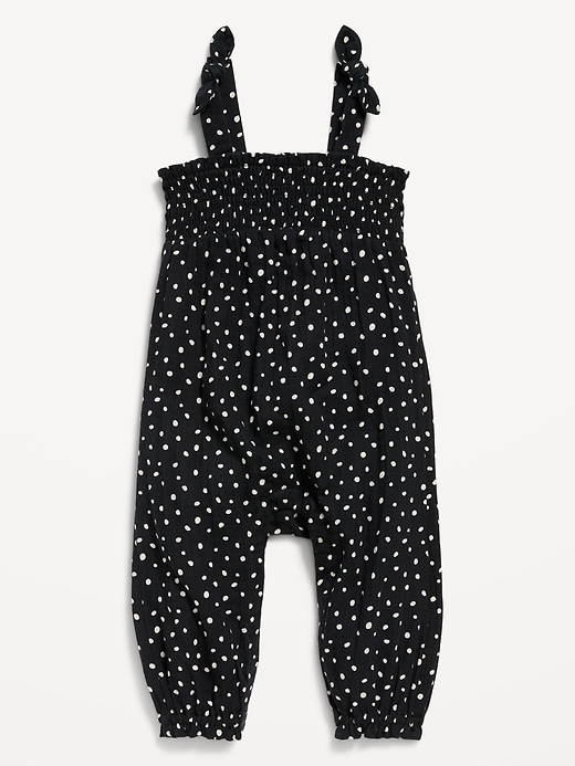 View large product image 1 of 2. Printed Sleeveless Smocked Tie-Knot Jumpsuit for Baby