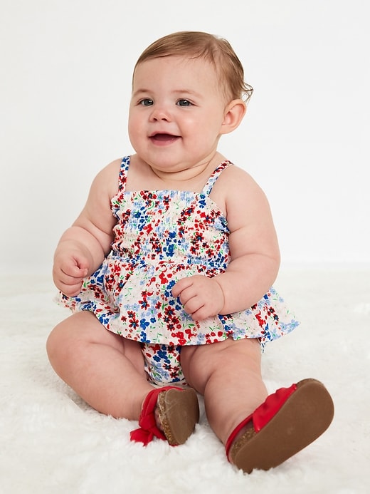 View large product image 1 of 2. Sleeveless Smocked Ruffled One-Piece Romper for Baby