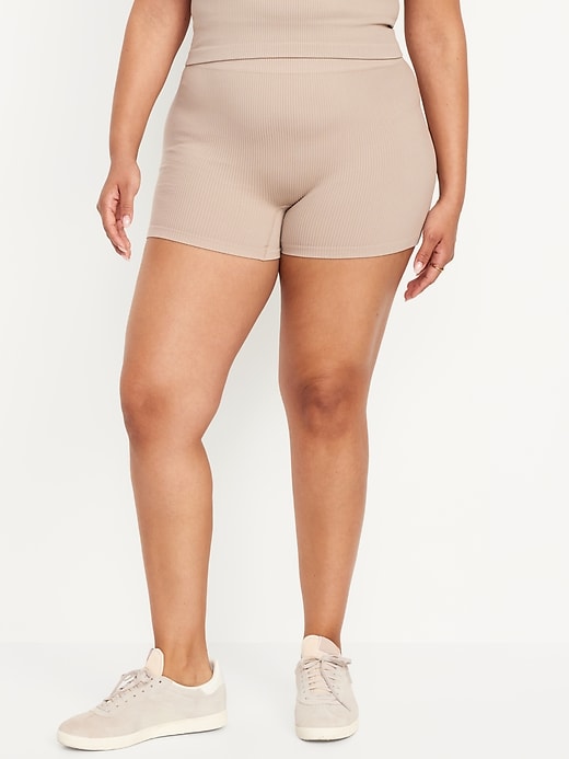 Image number 7 showing, Extra High-Waisted Seamless Ribbed Biker Shorts -- 4-inch inseam