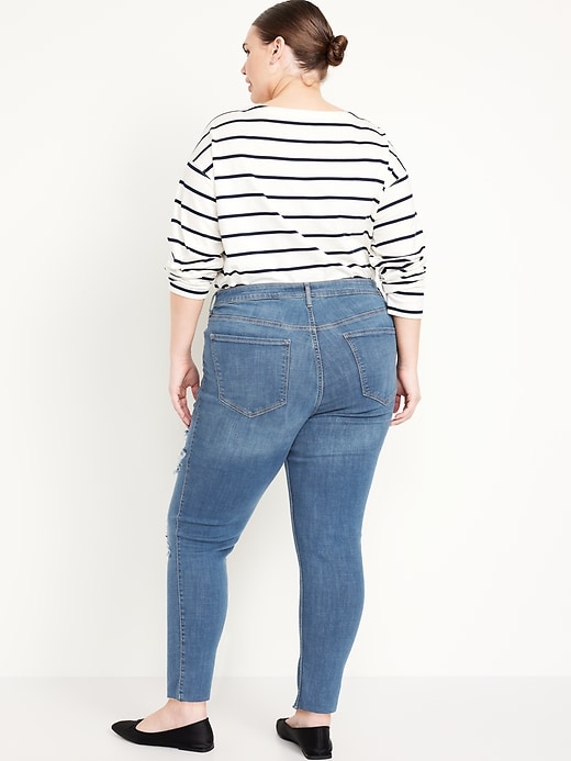 Image number 8 showing, Extra High-Waisted Rockstar 360° Stretch Super-Skinny Ripped Jeans