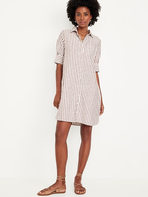 chinese dress ladies White linen shirt dress with mother of pearl buttons and pockets main image 0
