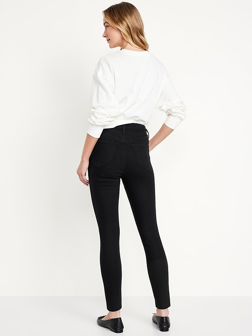 Image number 3 showing, Extra High-Waisted Button-Fly Rockstar 360° Stretch Super-Skinny Cropped Cut-Off Jeans