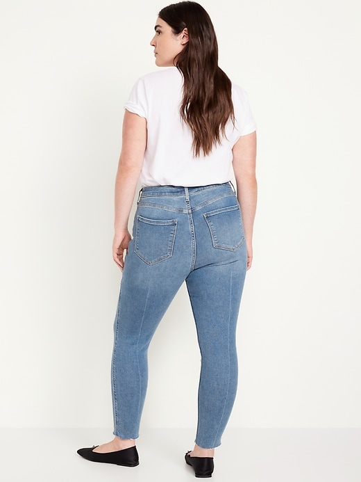 Image number 6 showing, Extra High-Waisted Rockstar 360° Stretch Super-Skinny Cut-Off Ankle Jeans