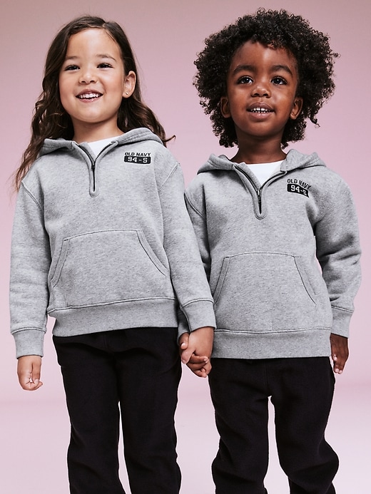 Image number 1 showing, '94 Unisex Half-Zip Logo-Graphic Hoodie for Toddler