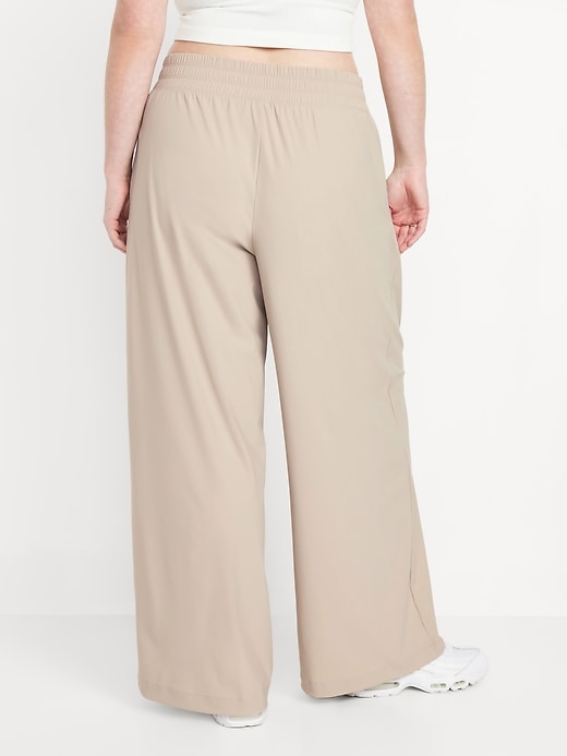 Image number 5 showing, Extra High-Waisted SleekTech Pleated Trousers