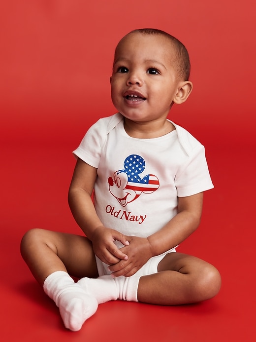 Image number 1 showing, Old Navy x Disney© Mickey Mouse Flag Logo-Graphic Bodysuit for Baby