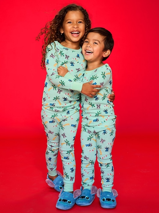 Image number 1 showing, Old Navy x Disney Unisex Graphic Snug-Fit Pajama Set for Toddler & Baby