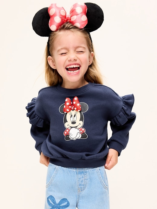 Image number 1 showing, Old Navy x Disney Minnie Mouse Graphic Ruffle-Sleeve Sweatshirt for Toddler Girls