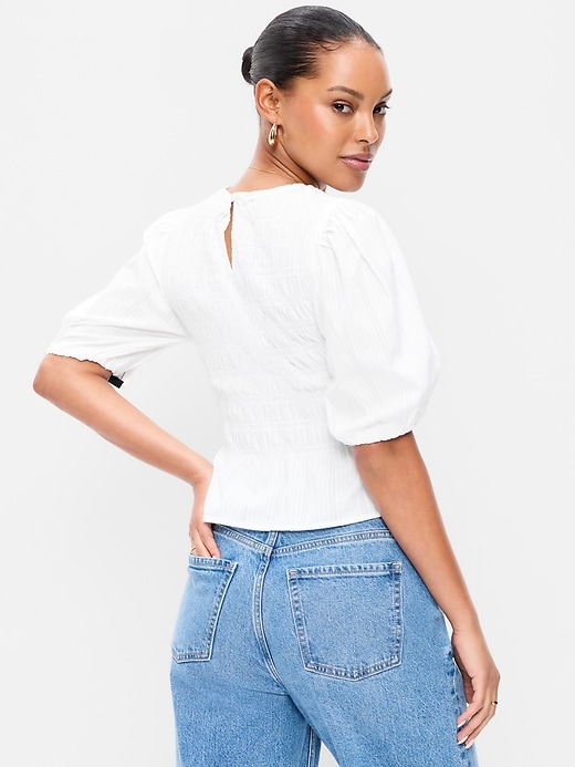 Image number 2 showing, Smocked Puff Sleeve Peplum Top