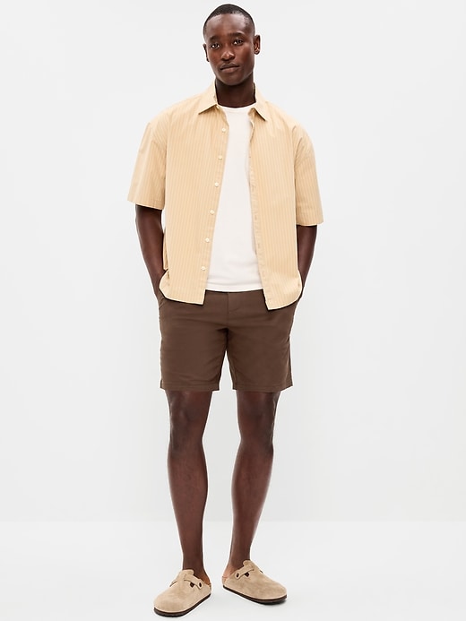Image number 1 showing, Slim Built-In Flex Rotation Chino Shorts -- 8-inch inseam