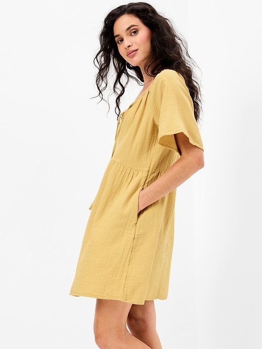 Image number 1 showing, Crinkle Gauze Flutter-Sleeve Mini Swing Dress