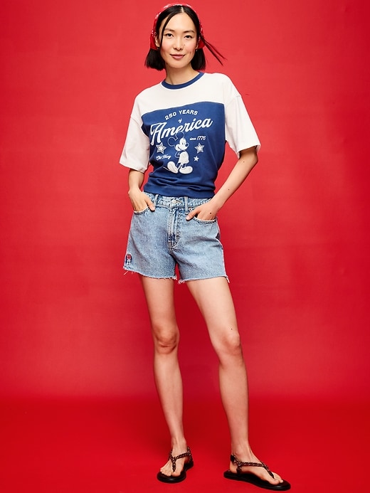 Image number 1 showing, Old Navy x Disney Minnie Mouse High-Waisted OG Jean Cut-Off Shorts-- 4-inch inseam for Women