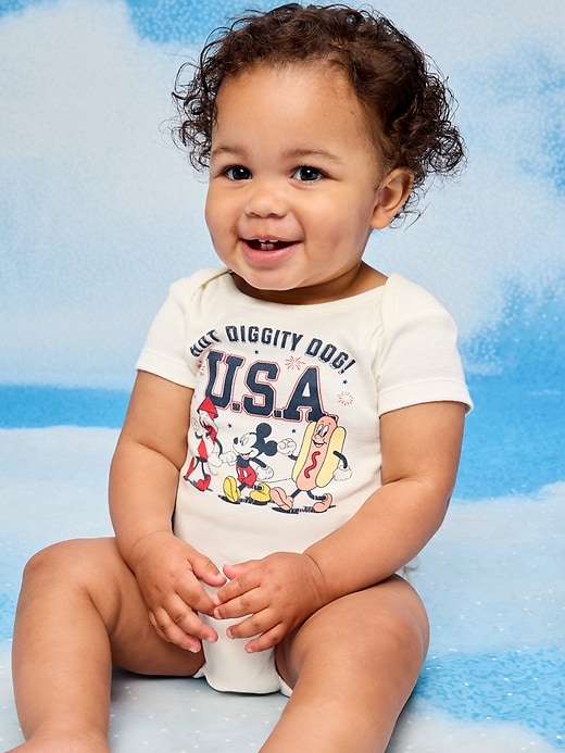 Image number 1 showing, Old Navy x Disney Mickey Mouse Short-Sleeve Unisex Graphic Bodysuit for Baby