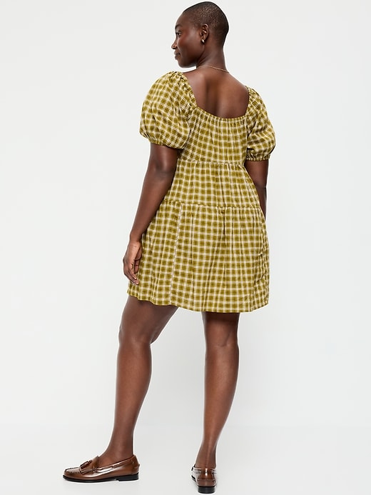 Image number 7 showing, Puff-Sleeve Smocked Mini Swing Dress