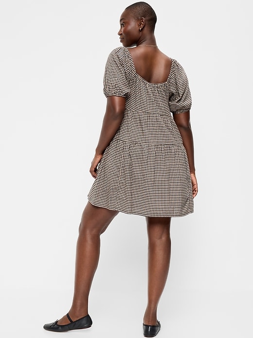 Image number 7 showing, Puff-Sleeve Smocked Mini Swing Dress