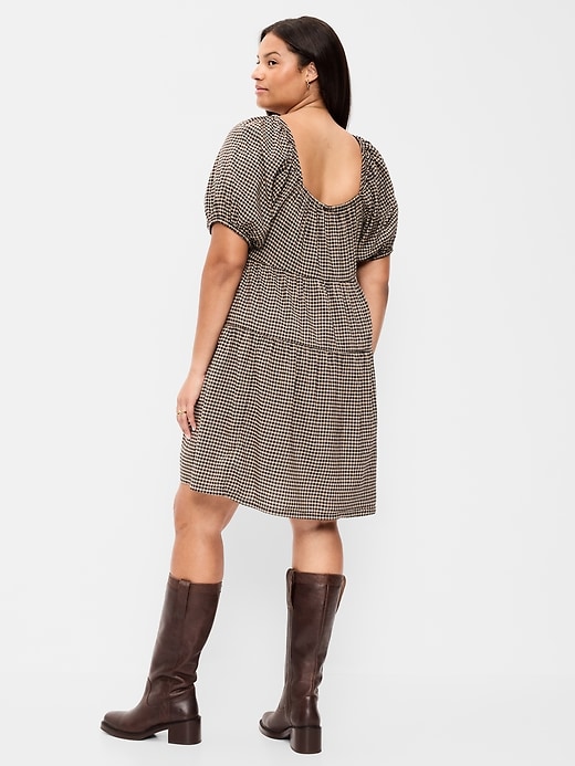 Image number 9 showing, Puff-Sleeve Smocked Mini Swing Dress