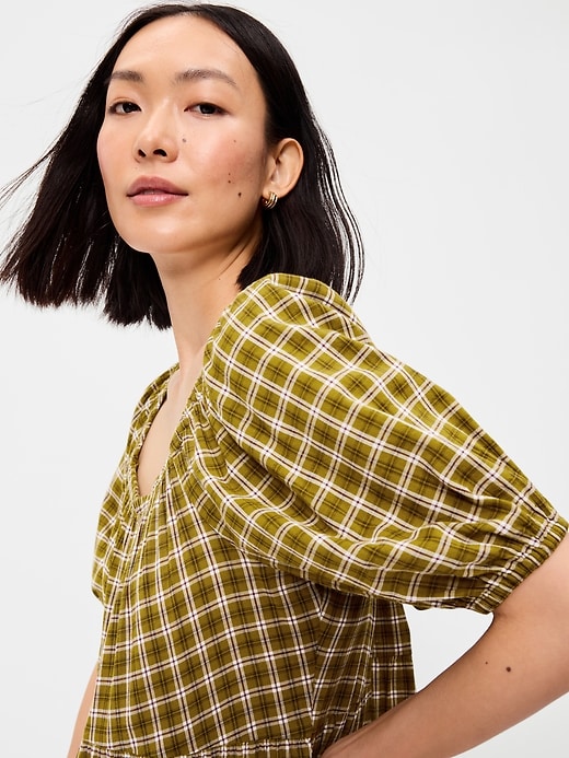 Image number 5 showing, Puff-Sleeve Smocked Mini Swing Dress