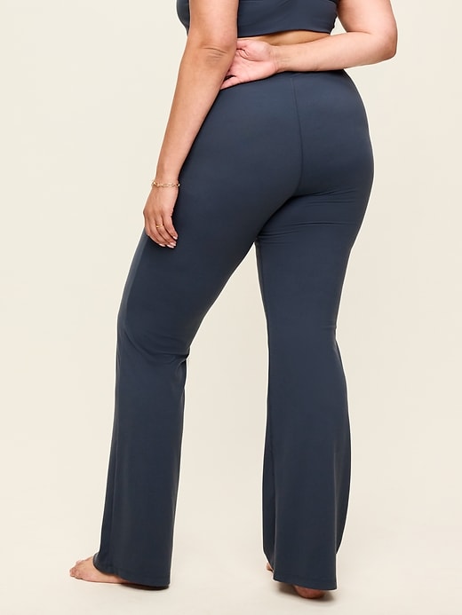 Image number 8 showing, Crossover-Waist StudioSmooth Flare Leggings